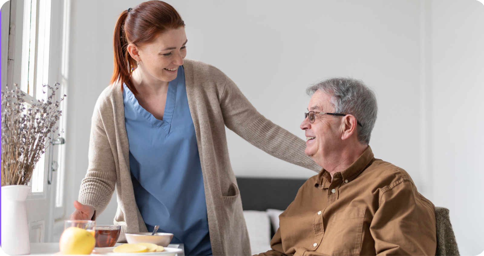 Nurse supporting elderly man